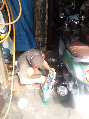 bengkel motor m2